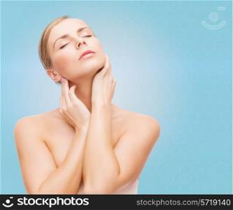 beauty, people and health concept - beautiful young woman with closed eye touching her neck over blue background