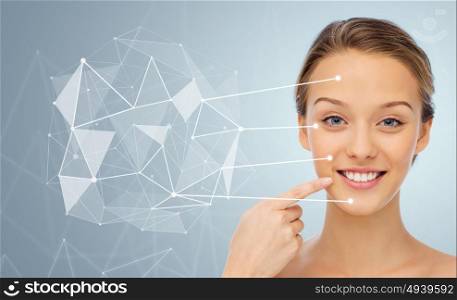 beauty, people and health concept - smiling young woman face and shoulders over gray background with low poly projection and pointers. smiling young woman face and shoulders