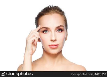 beauty, people and plastic surgery concept - beautiful young woman showing her forehead over white background