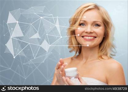 beauty, people, skincare and cosmetics concept - happy woman holding moisturizer jar over gray background with low poly projection and pointers. woman with moisturizer and low poly projection