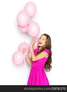 beauty, people, style, holidays and fashion concept - happy young woman or teen girl in pink dress with helium air balloons