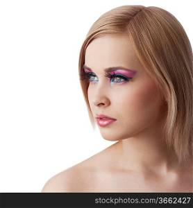 beauty portrait of blond young girl looking sideways with colourfull makeup and hair style isolated over white background