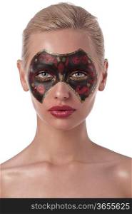beauty portrait of pretty blond girl with a creative make up like a carnival mask black and red