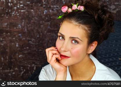 Beauty portrait of young attractive woman, isolated on dark studio