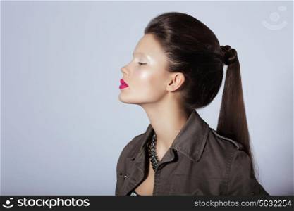 Beauty. Profile of Young Stylish Brunette with Tress