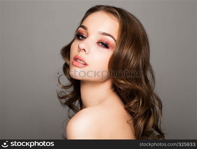 Beauty red eyes pink lips makeup fashion model on black background