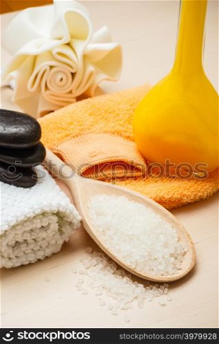 Beauty relaxation and body care. Closeup spa products some bath accessories on wooden table.