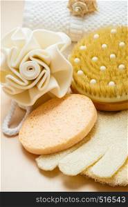 Beauty relaxation and body care. Closeup spa products some bath accessories on wooden table.
