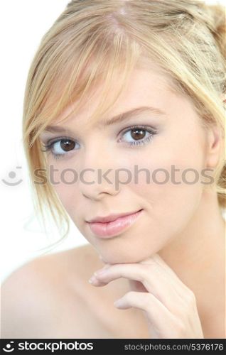 Beauty shot of a woman&rsquo;s face and hands