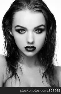 Beauty smokey eyes red lips makeup wet hair model on grey background