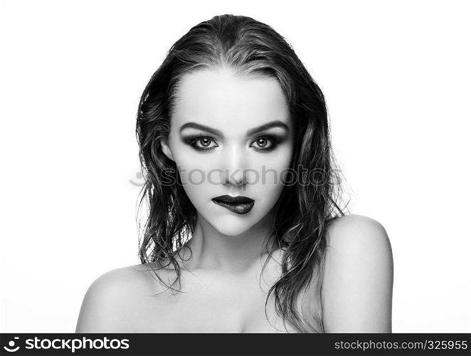 Beauty smokey eyes red lips makeup wet hair sexy model on grey background