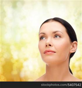 beauty, spa and health concept - relaxed young woman
