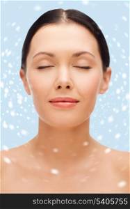 beauty, spa and health concept - relaxed young woman with closed eyes