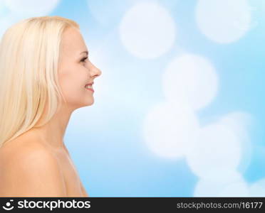 beauty, spa and health concept - smiling young woman