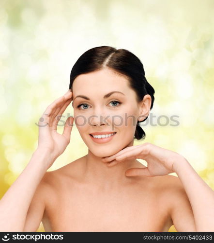 beauty, spa and health concept - smiling young woman