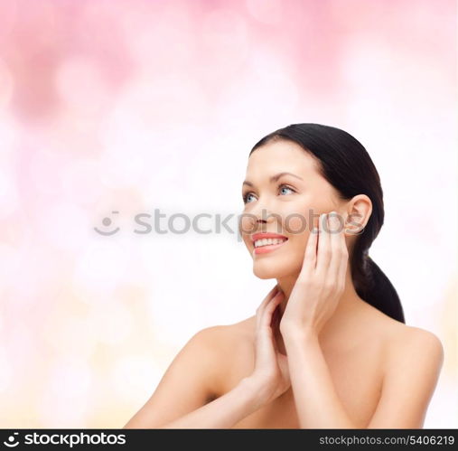 beauty, spa and health concept - smiling young woman