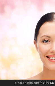 beauty, spa and health concept - smiling young woman