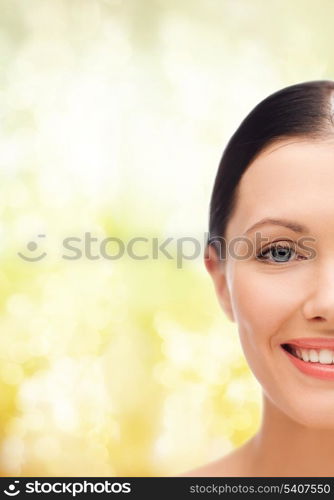 beauty, spa and health concept - smiling young woman