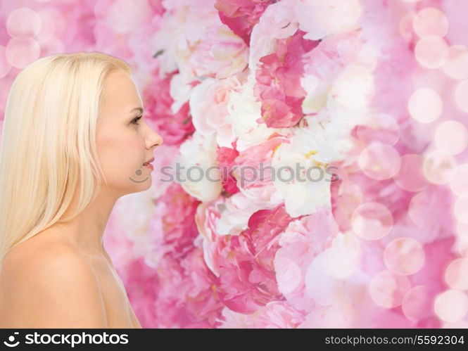 beauty, spa and health concept - smiling young woman