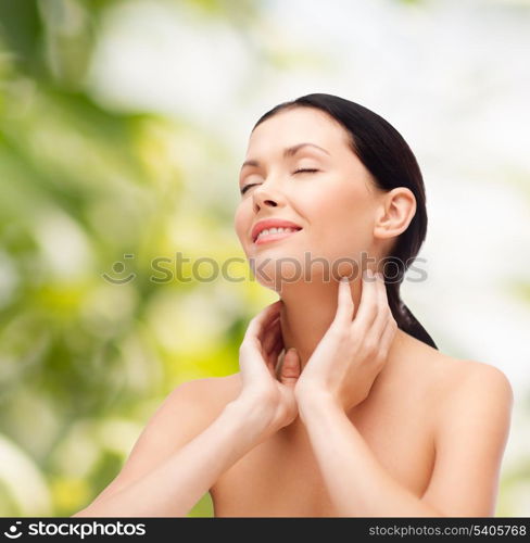 beauty, spa and health concept - smiling young woman with closed eyes