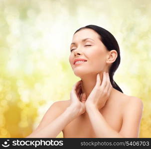 beauty, spa and health concept - smiling young woman with closed eyes