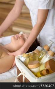 Beauty spa products in massage room woman enjoy treatment