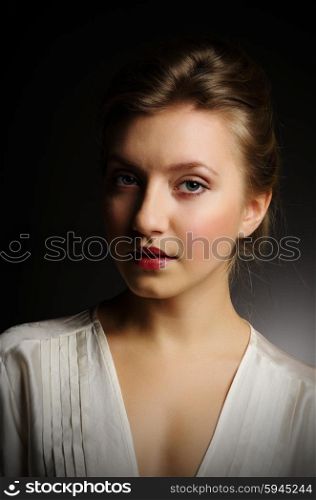 Beauty style portrait of young girl on grey background
