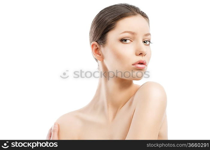 Beauty style portrait of young woman with healthy skin and wet hair . close up on face. Her face is turned of three- quarters, she looks in to the lens and has the left shoulder more raised than the right.