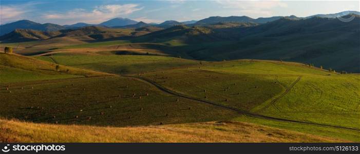 Beauty summer evening in the mountains in Altay, panoramic picture. Beauty summer evening in the mountains