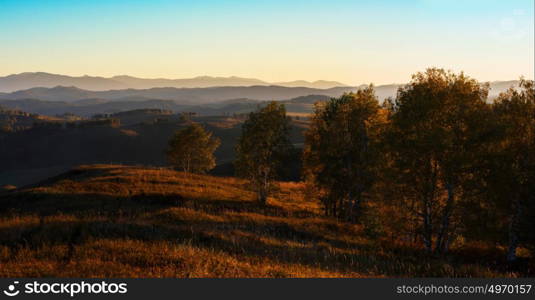 Beauty sunset in the mountains in Altay, panoramic picture