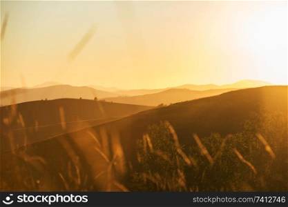 Beauty sunset in the mountains in Altay, panoramic picture. Beauty sunset in the mountains