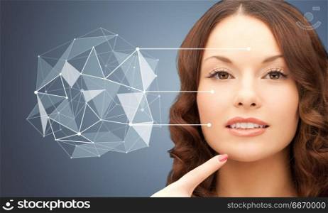 beauty, technology and people concept - beautiful young woman pointing finger to her chin over blue background with low poly shape projection. beautiful woman with low poly shape projection. beautiful woman with low poly shape projection