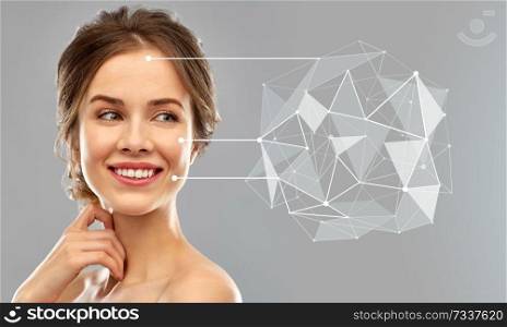 beauty, technology and people concept - smiling young woman pointers on skin and low poly shape over grey background. young woman with skin pointers and low poly shape