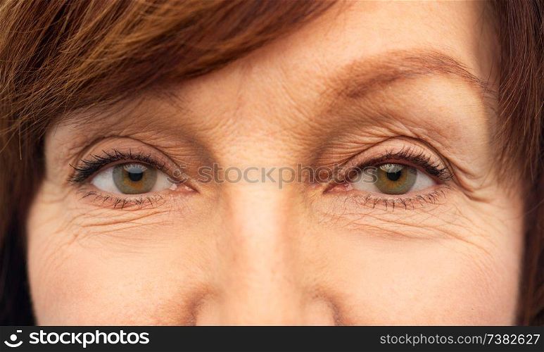 beauty, vision and old people concept - eyes of senior woman. eyes of senior woman
