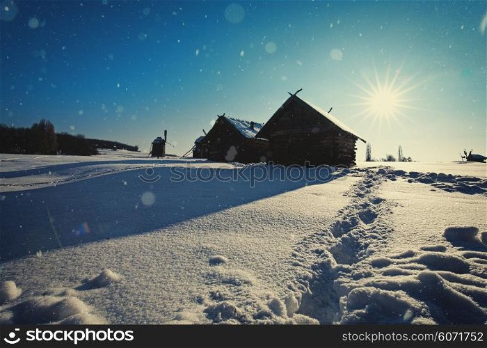 Beauty winter in the village, abstract seasonal backgrounds