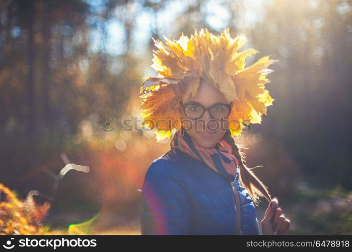 Beauty woman at autumn park. Beauty woman at autumn park in sunny beauty day