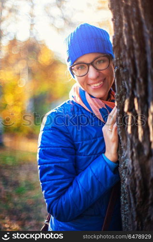 Beauty woman at autumn park. Beauty woman at autumn park in sunny beauty day