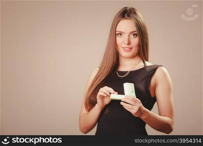 Beauty woman with present. Happiness and love. Portrait of young attractive smiling woman model holding opening gift little box present. Beauty and elegance of women.