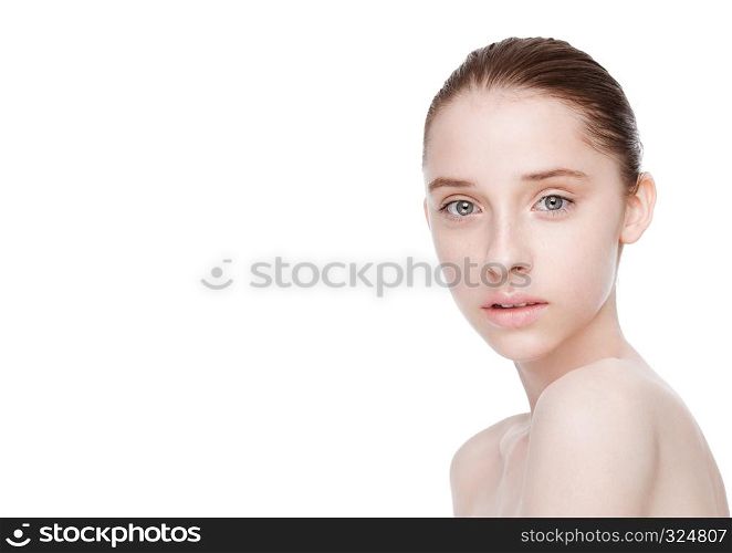 Beauty young cute fashion model with natural makeup skin care and spa treatment. Perfect skin with freckles