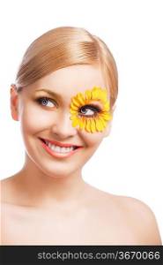 beauty young girl with a floral makeup. She laughs and looks at right