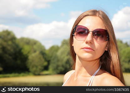 beauty young woman in sunglasses
