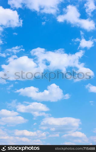 Beautyful blue sky with white clouds - vertical background with space for your own text