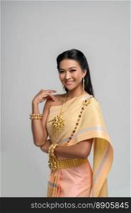 Beautyful Thai woman wearing Thai dress and smile