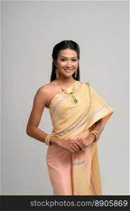 Beautyful Thai woman wearing Thai dress and smile