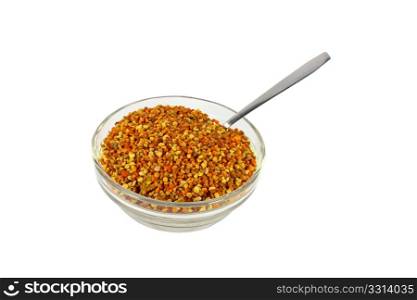 Bee pollen in glass bowl isolated on white