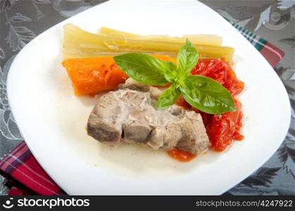 beef broth with pieces of veal cooked