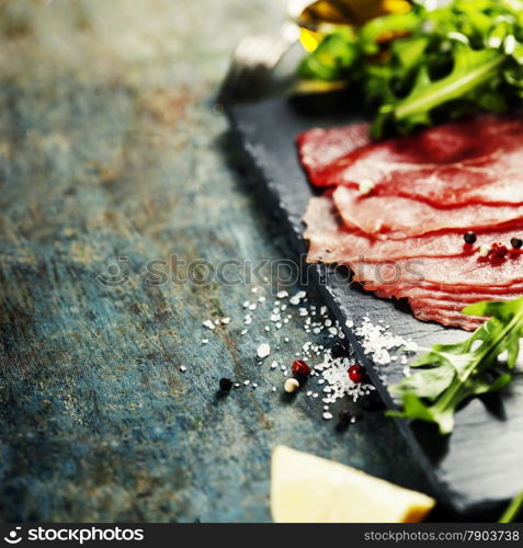 Beef Carpaccio on dark background