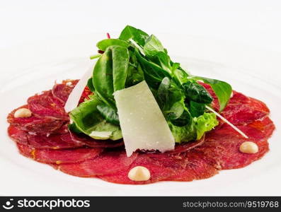 Beef carpaccio with parmesan cheese close up