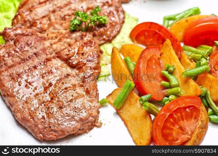 Beef chop. Beef chop with vegetable and sauce