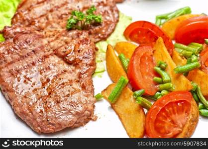 Beef chop. Beef chop with vegetable and sauce